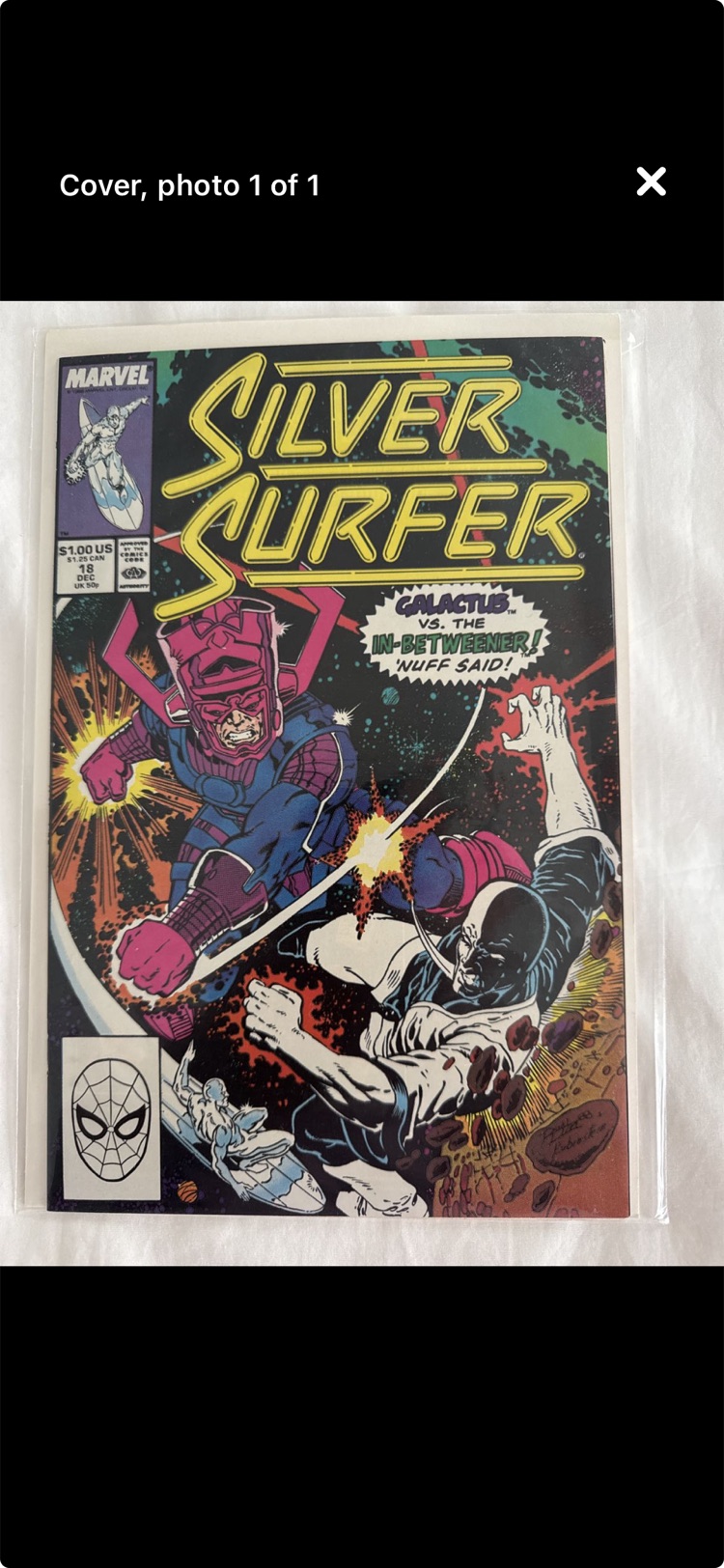 The full-screen photo viewer, labeled Cover, photo 1 of 1, showing the Silver Surfer #18 cover large enough to read the cover copy.